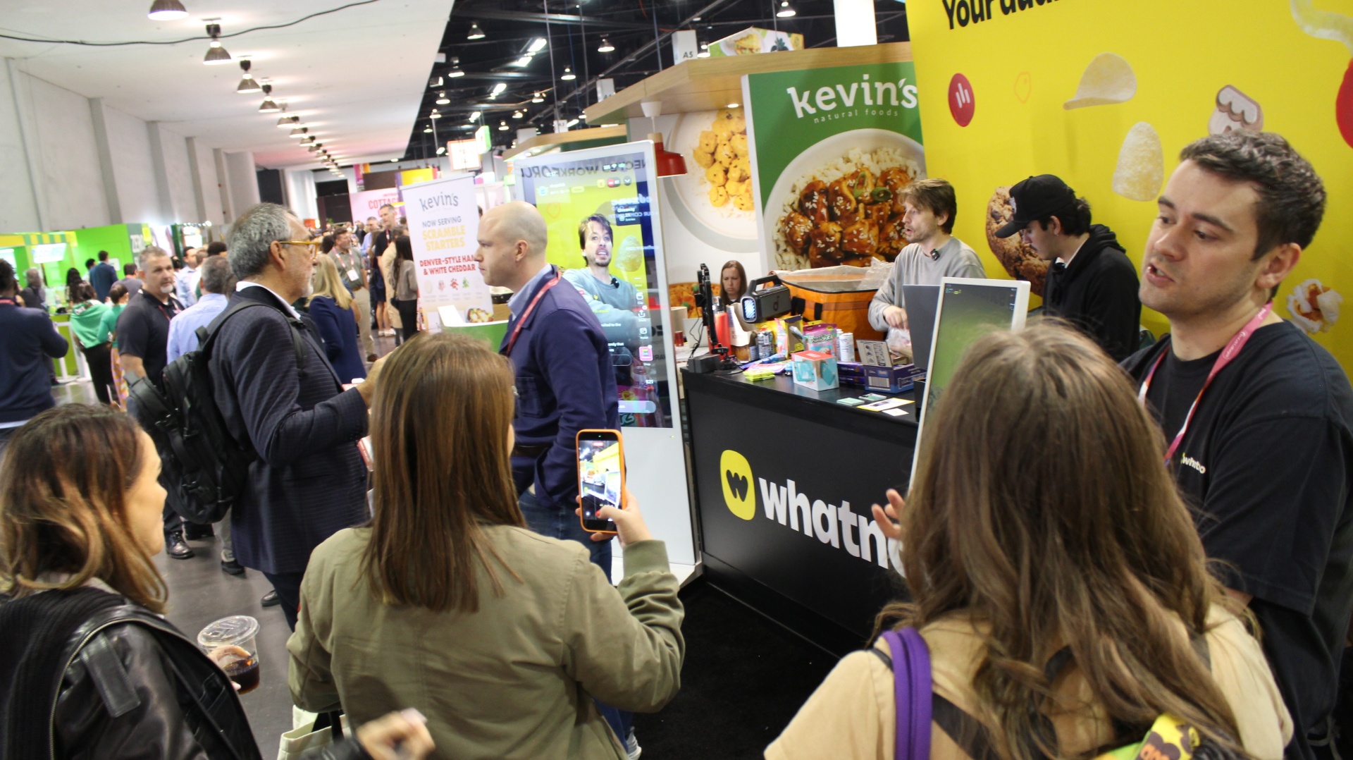 Shop Club crew at the Whatnot booth on the expo floor