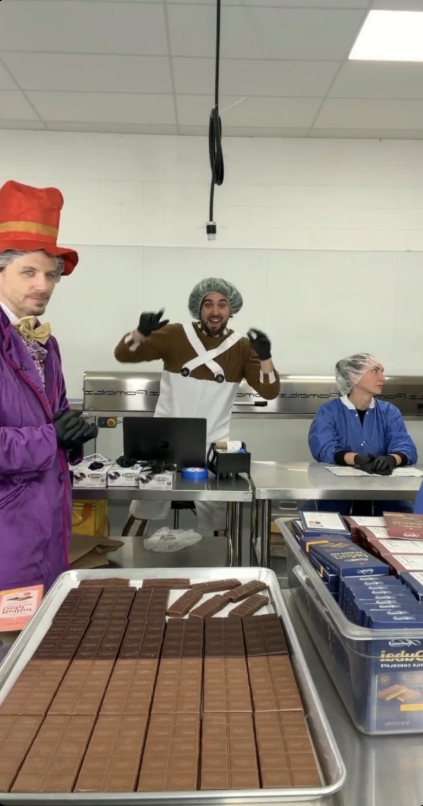 Willy Wonka themed live show with chocolate bar trays